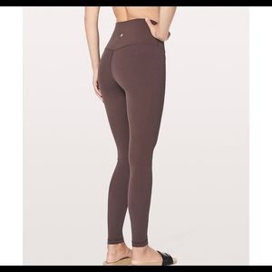Lululemon Wunder Train High-Rise Leggings 25”
Size 4 Brown